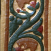 26. Bewcastle Cross (east face),upper section: squirrels in the inhabited vine scroll