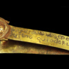 Gold strip with inscription